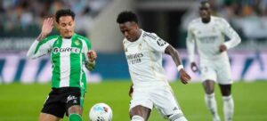 Jugadores del Betis y Madrid